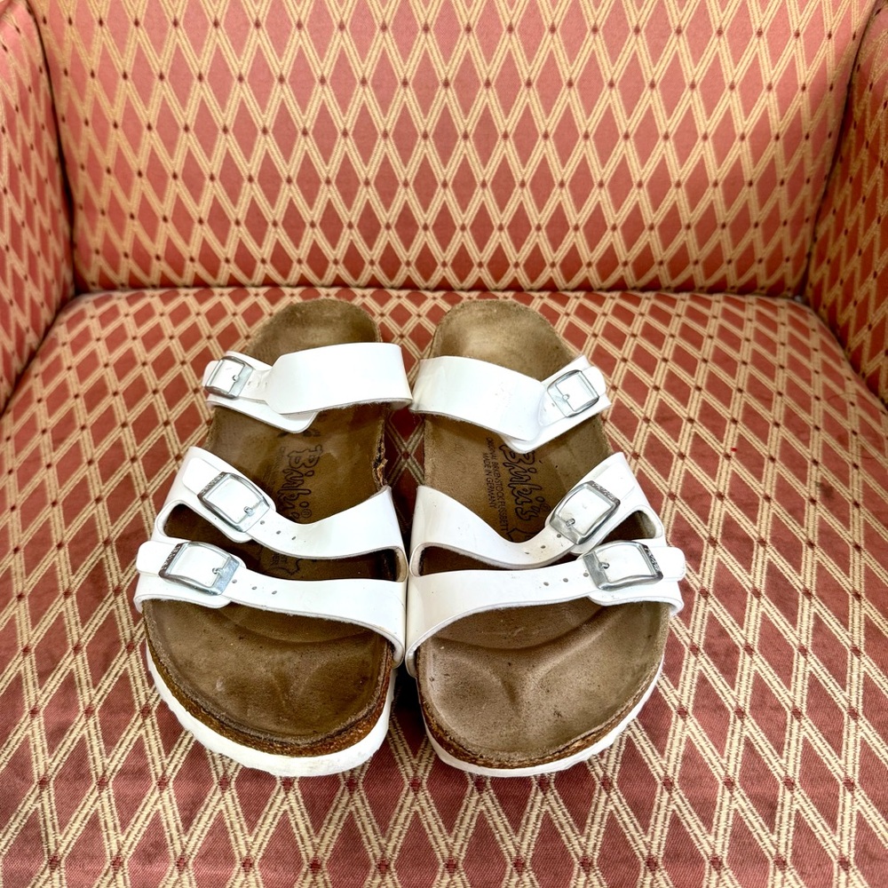 Birki’s White Triple-Strap Sandals